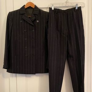 Beautiful charcoal grey pinstripe wool pantsuit. Beautiful design by CN